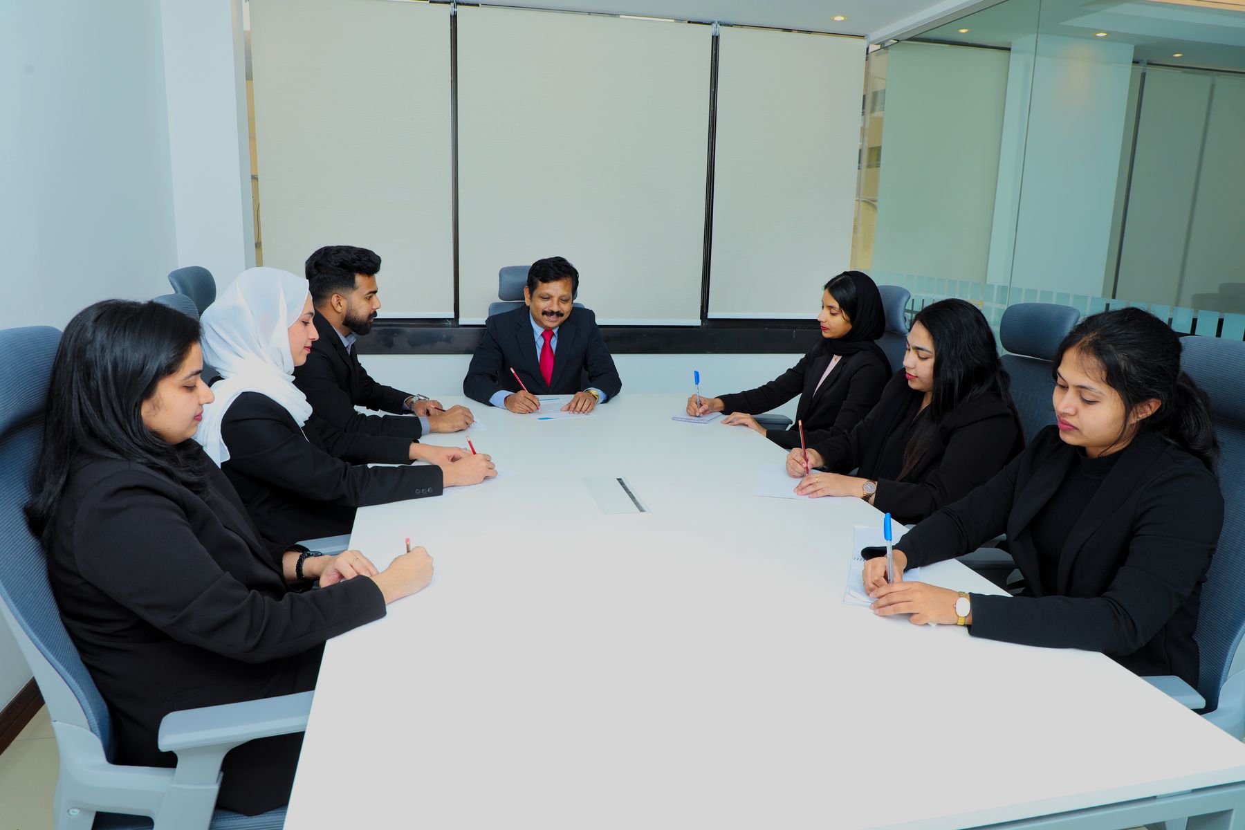 Team meeting around the meeting room table